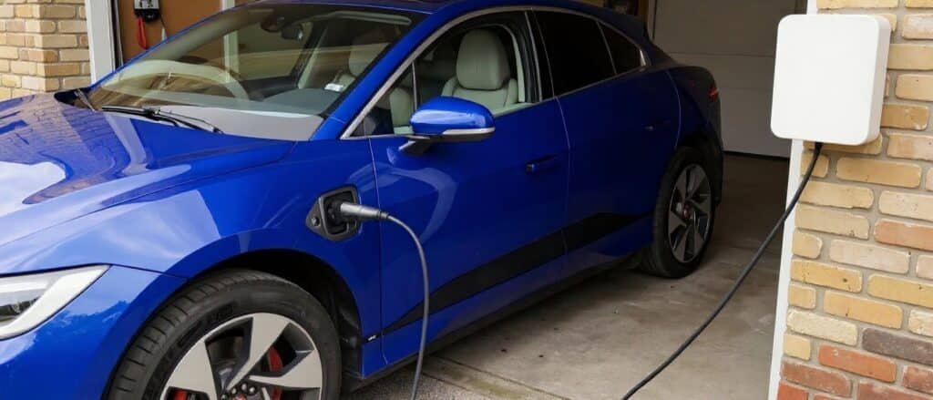 Electric vehicle charging in a home garage in Ontario