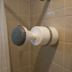 Crystal Quest Premium Shower Filter mounted on a shower wall