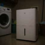 Midea 22 Pint dehumidifier in a laundry room