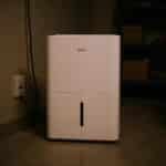 Midea 50 Pint dehumidifier in a basement