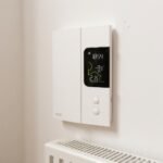 Best Smart Thermostat for Canada (2026) 3 Sinopé TH1123WF smart thermostat for electric baseboard heating